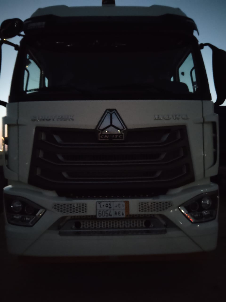 CNHTC truck, plate 6054 REA
