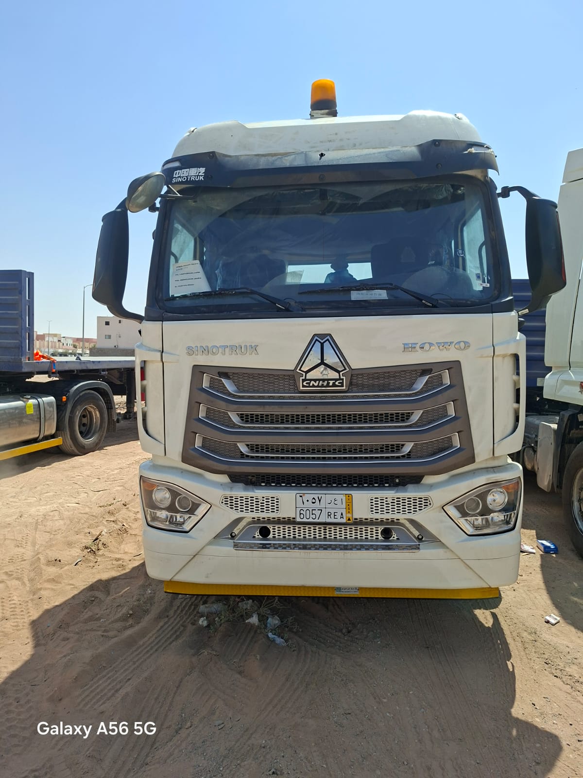 CNHTC truck, plate 6057 REA