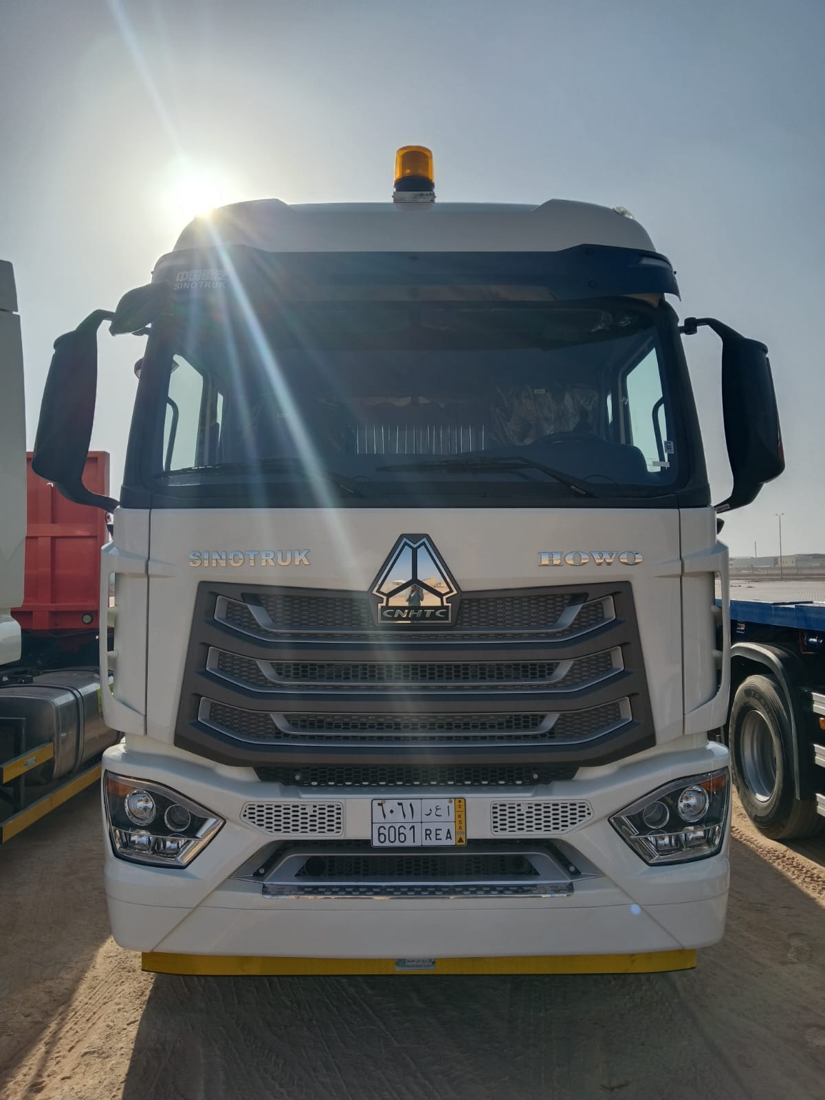 CNHTC truck, plate 6061 REA