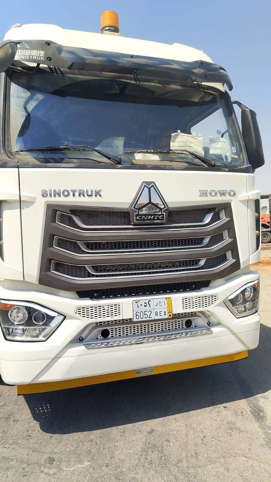 CNHTC truck, plate 6052 REA