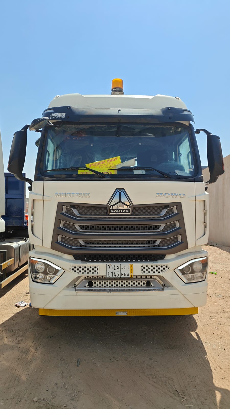 CNHTC truck, plate 6145 REA
