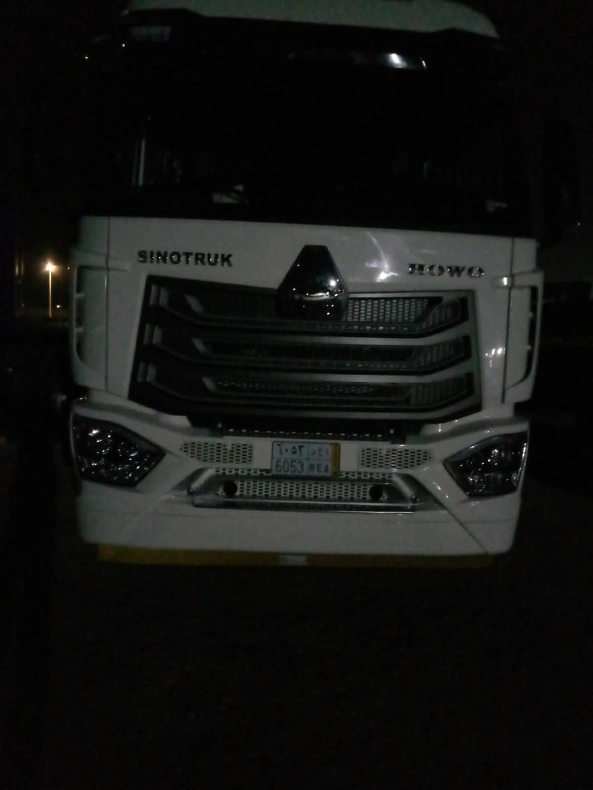 CNHTC truck, plate 6053 REA